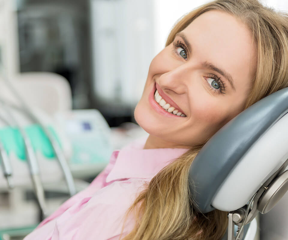 young woman in dental chair